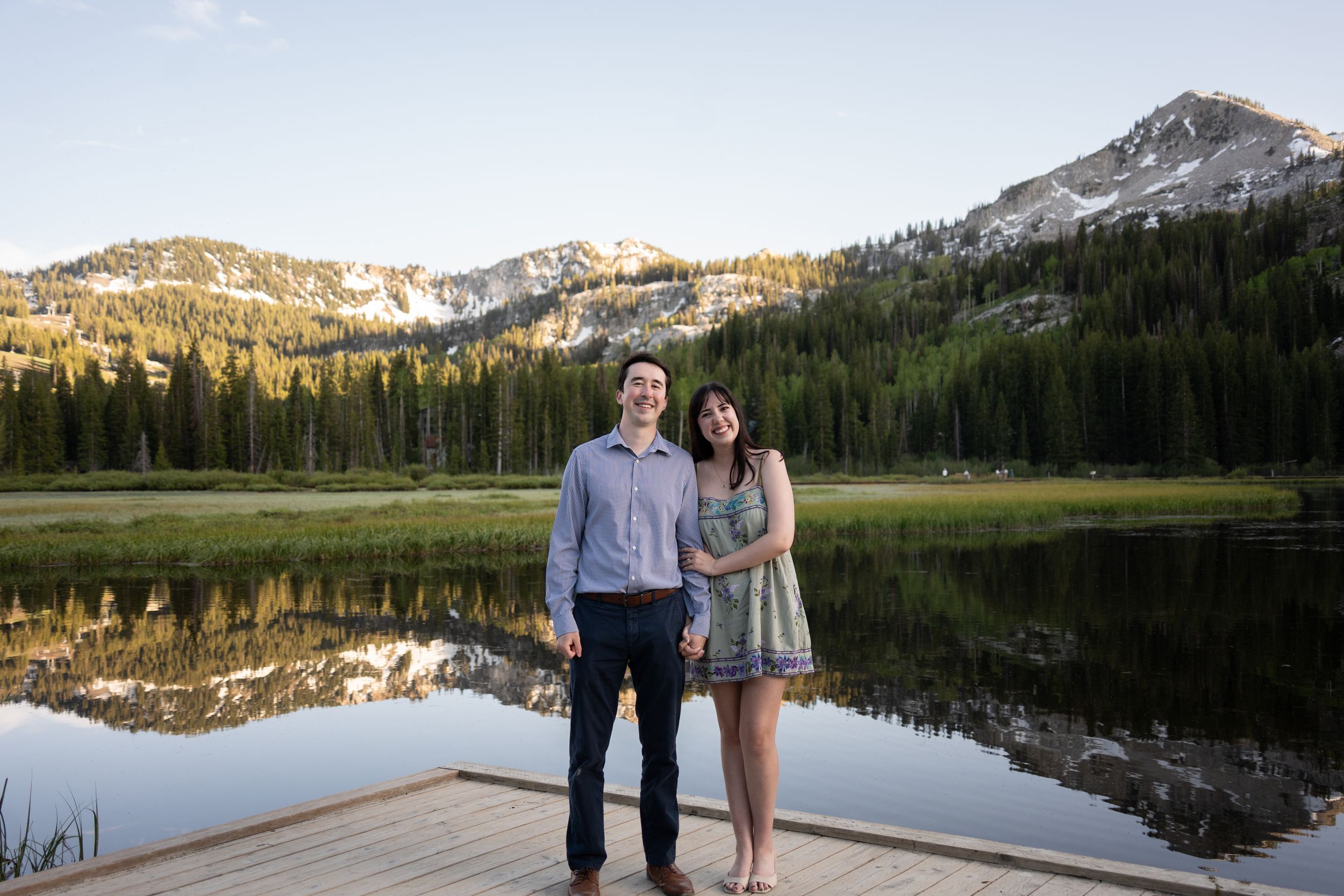 Mountain summit view in the Wasatch range, Utah, with couple in the foreground