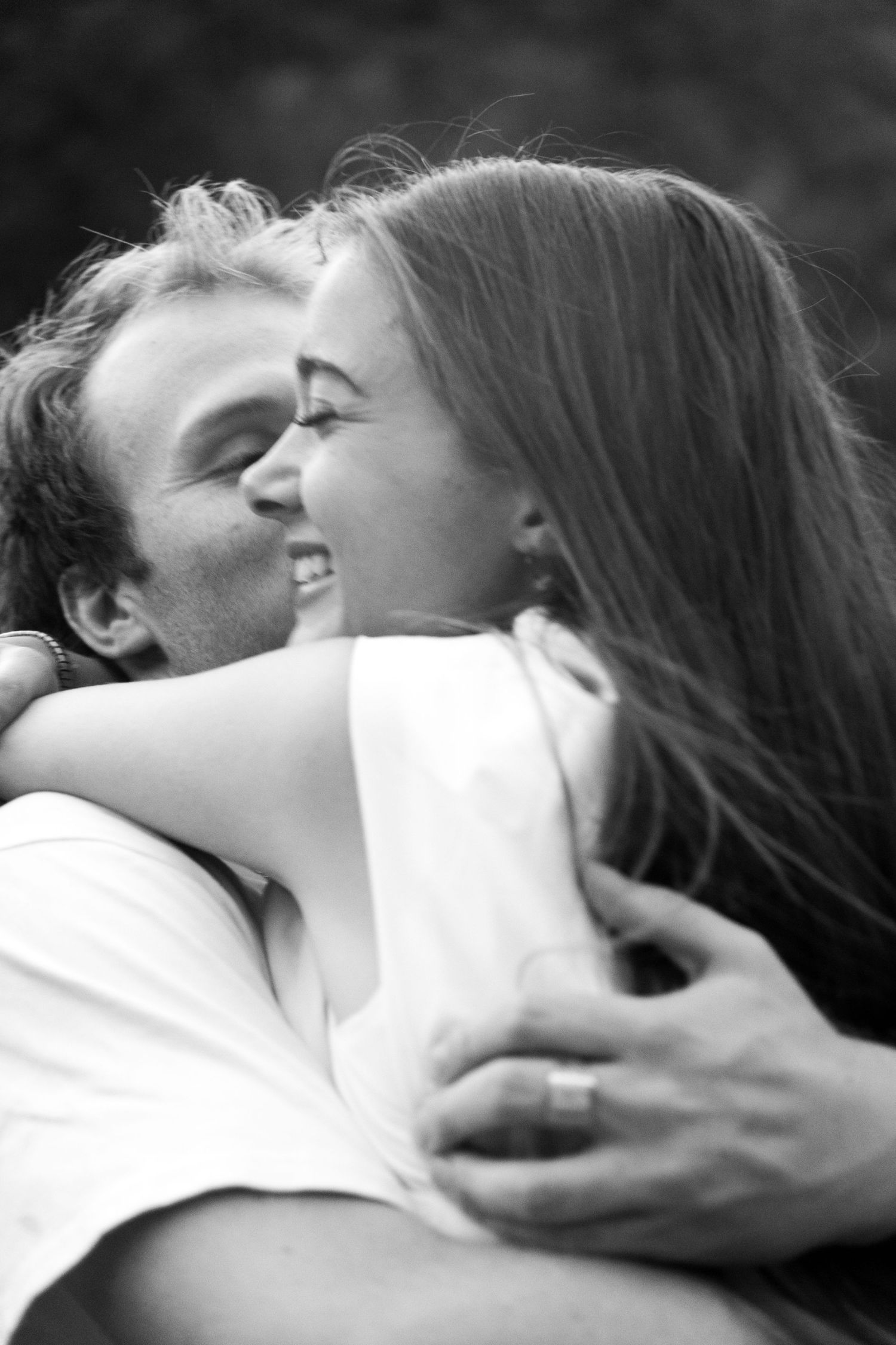 boyfriend and girlfriend hugging after summer proposal in Provo Canyon Utah