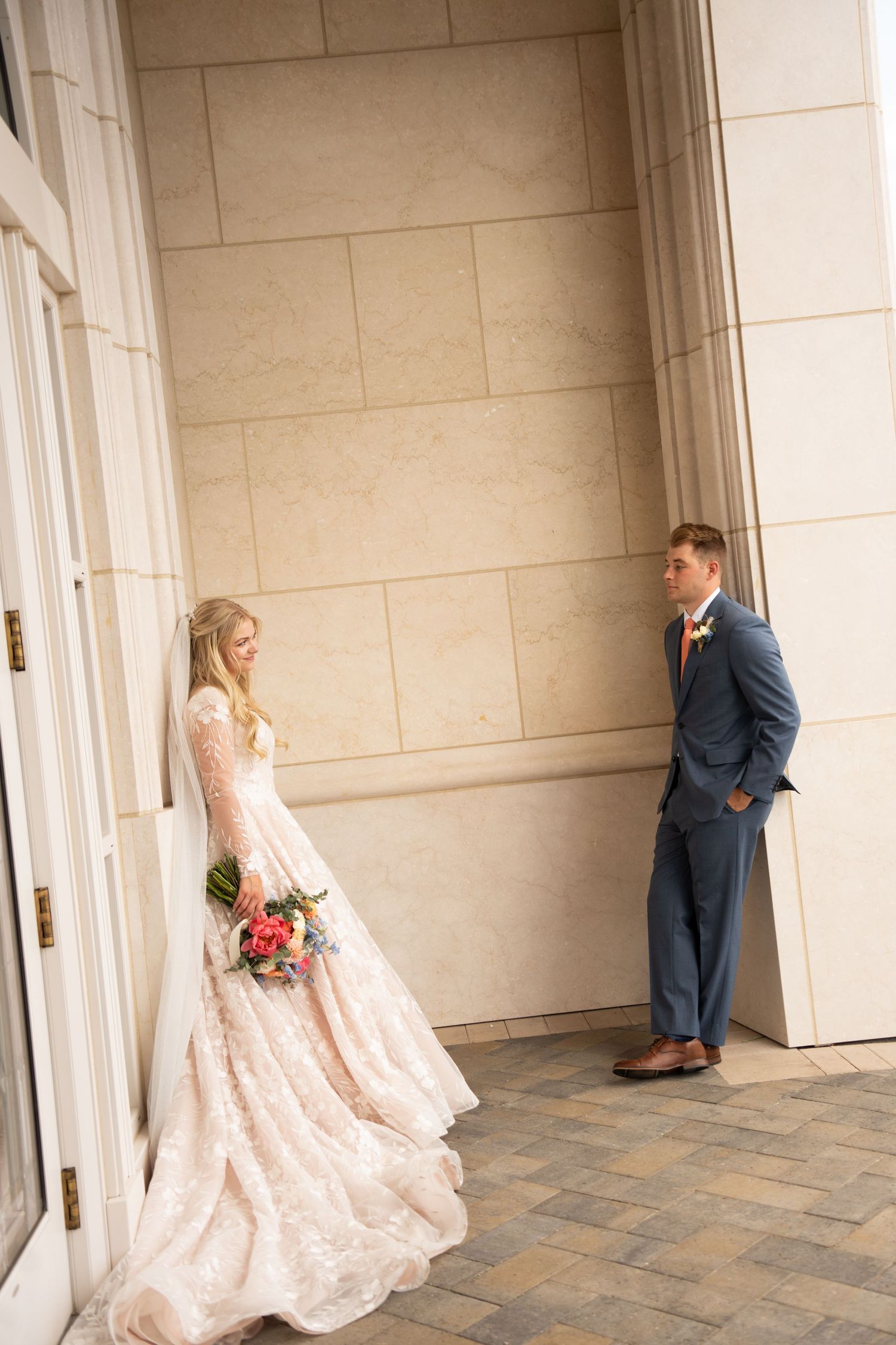 bride and groom looking at each other outside taylorsville utah temple romantic portrait bridal photo wedding day temple sealing portrait